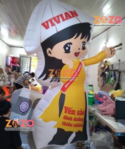 Rối hơi cô gái áo dài vàng